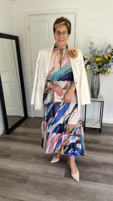 Instagram post by @stylishdalyte for Karen Millen. Caption reads: Styling Colourful Dress 🌈 Comment SHOP for direct....