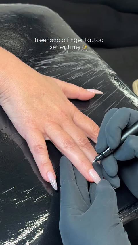 Instagram post by @sydsmithhh for Sharpie. Caption reads: Watch me freehand a finger tattoo set for my....