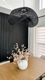 Instagram post by @miussetsantana for Rowabi. Caption reads: [...] I found this rattan ceiling lamp from....