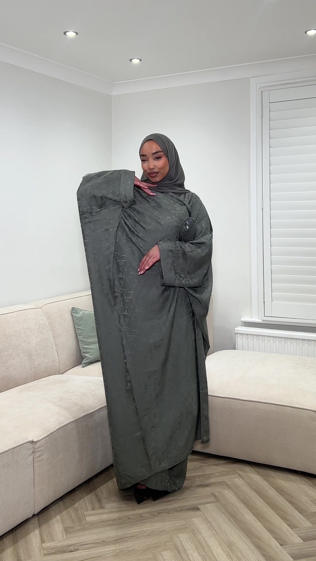 TikTok post by @manalmiaa for Hawaa Clothing. Caption reads: the vibe is @hawaa_clothing 🫂 ✨ shop via tiktok....