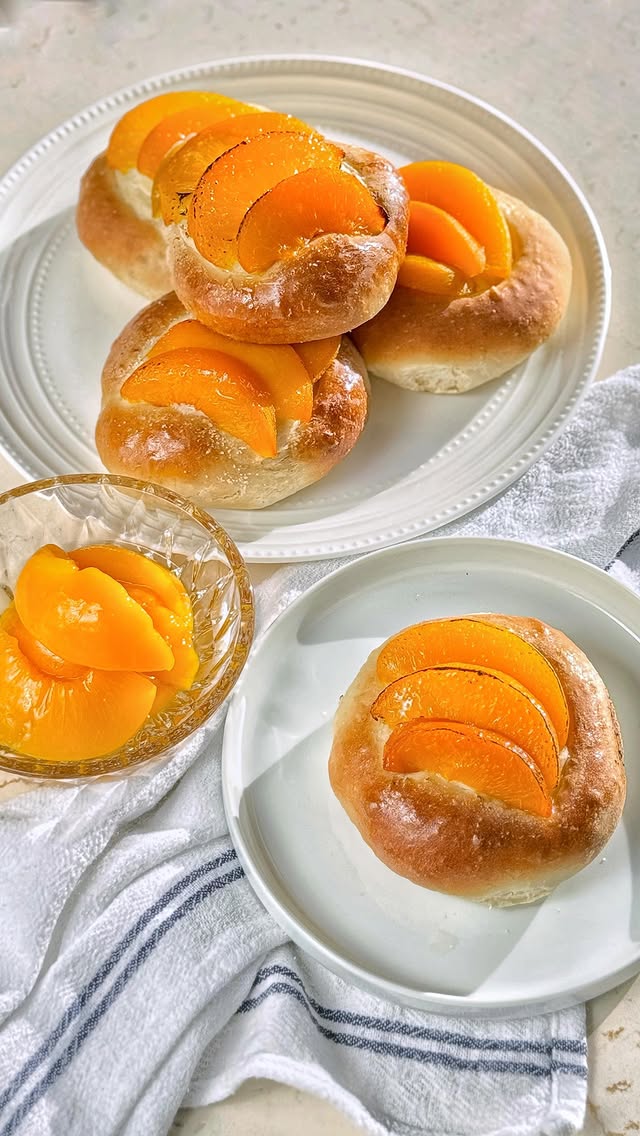 Instagram post by @granny_aye for Bake from Scratch. Caption reads: 🟡Canned Peach Buns🟡 Got 3 big jars of yellow....