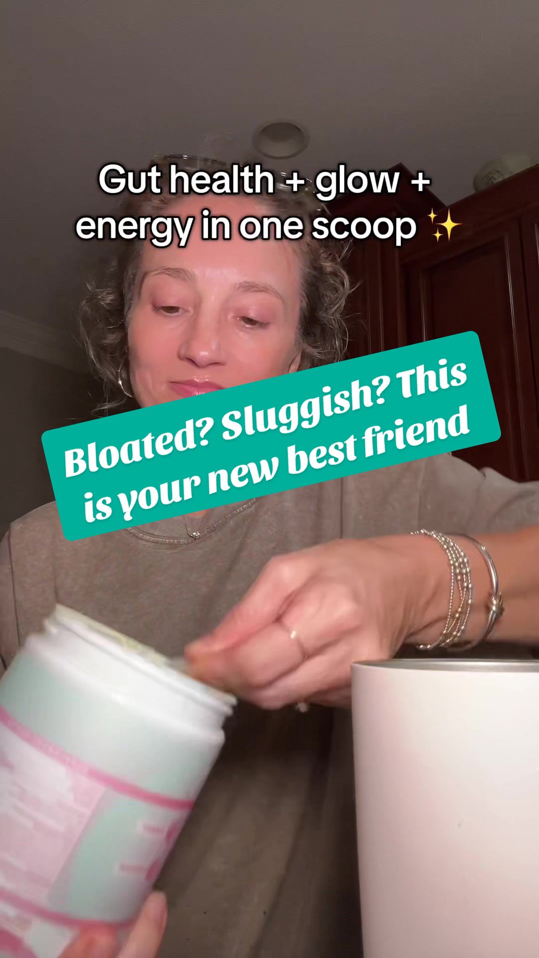 TikTok post by @amfoster01 for KIALA NUTRITION. Caption reads: No more bloat. Just a scoop of Kiala supergreens &....