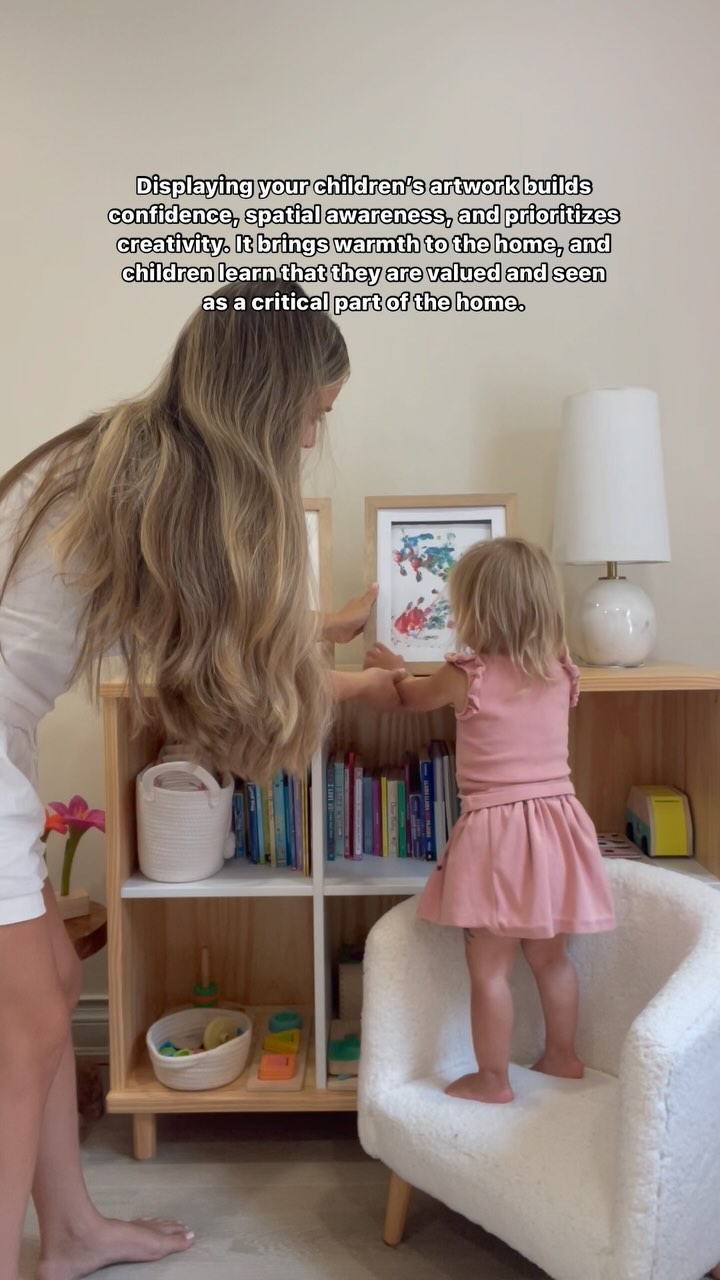 Instagram post by @themindfulblonde for Opposite Wall. Caption reads: After discovering @oppositewall kids art frames....
