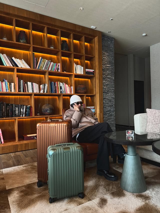 Instagram post by @exxxile_shokichi for RIMOWA. Caption reads: [...] tells a new story. 旅は、いつも新しいストーリーを刻む @rimowa....