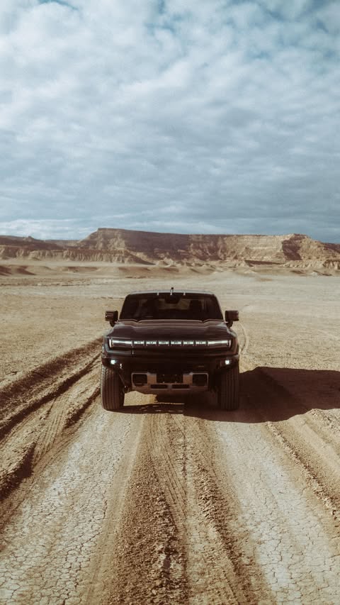 Instagram post by @tuckerdoss for GMC. Caption reads: Heading out west with @gmc and the #HUMMEREV on....
