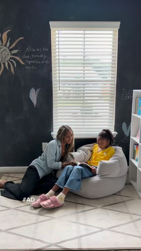 Instagram post by @puremomblog for Scholastic. Caption reads: [...] titles to her collection, thanks to....