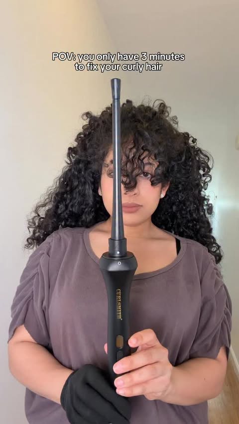Instagram post by @curlswithalexa for CURLSMITH. Caption reads: [...] the Defrizzion Curl Reviving Wand from....