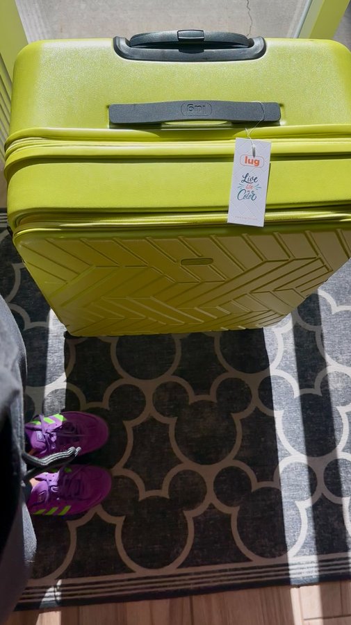 Instagram post by @thehappiestclubonearth for Lug. Caption reads: [...] lime 

🧳 This bold beauty from @luglife is....