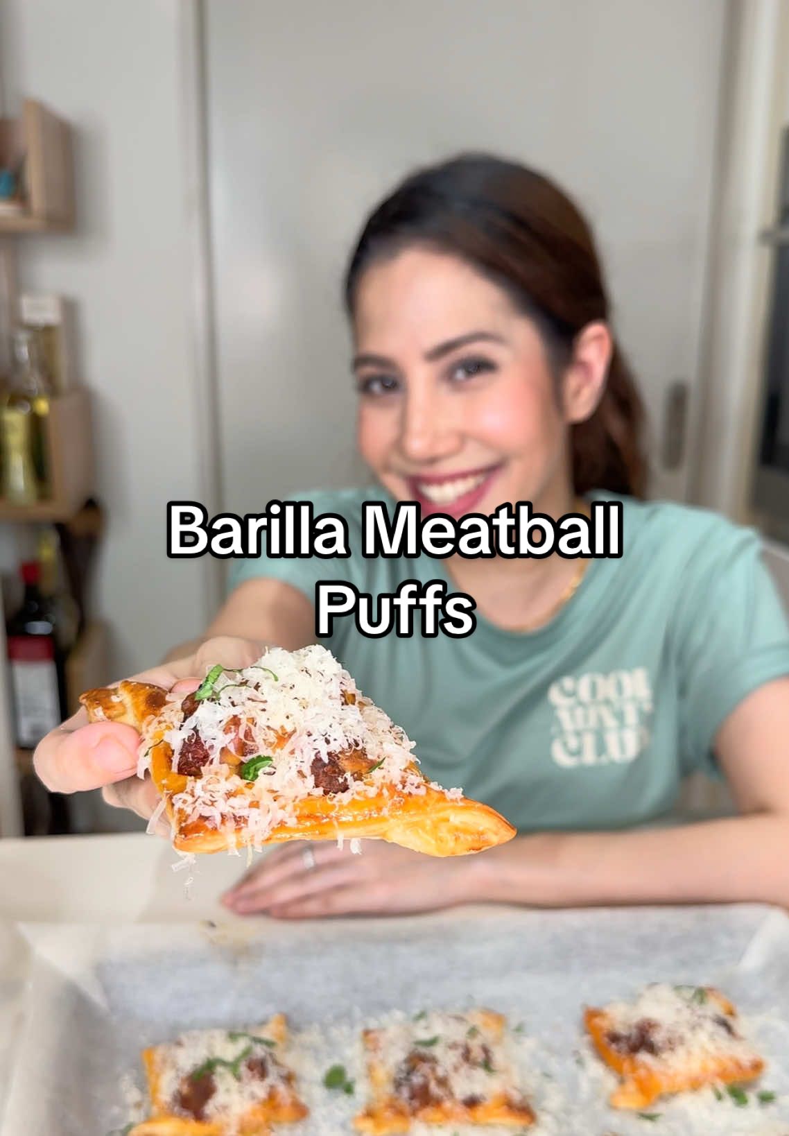 TikTok post by @aniscooks for Barilla. Caption reads: These meatball puffs are everything I love in a....