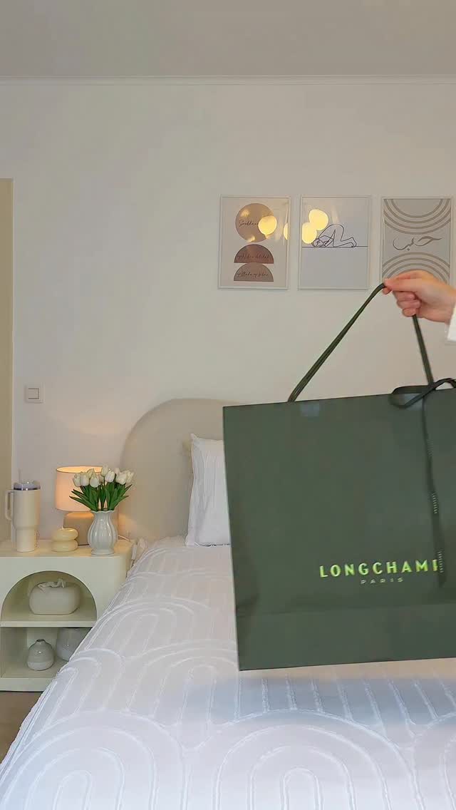 Instagram post by @oulfaxoul for Longchamp. Caption reads: Customize my Longchamp with me 🧸🍂☕️🍫✨.