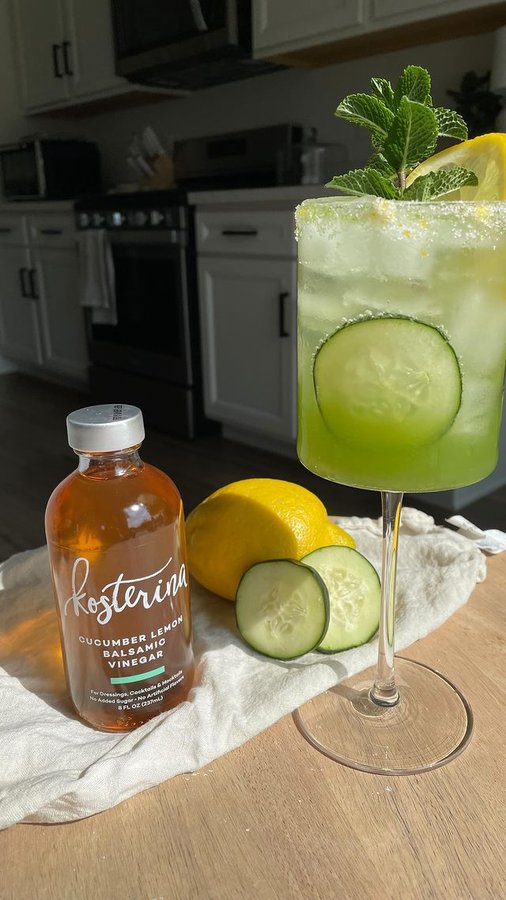 Instagram post by @mocktailgirlie for Kosterina. Caption reads: Let’s make a Cucumber Lemon Spritz! 

I’ve....