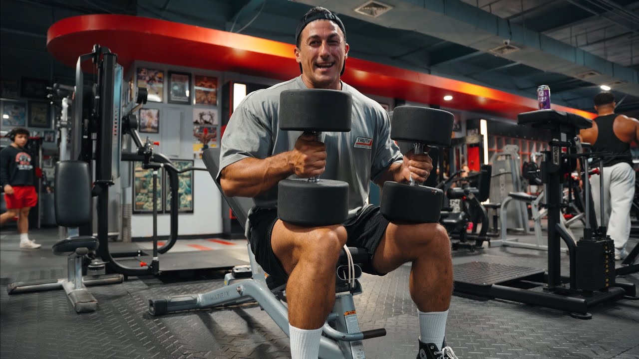 YouTube post by @SadikHadzovic1 for RYSE Supps. Caption reads: Four Exercises To Build A Bigger Chest + Tips.