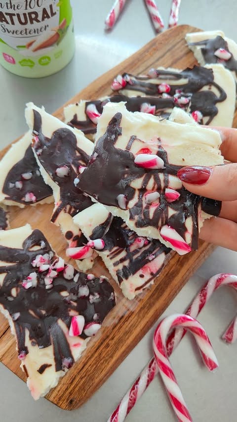 Instagram post by @jemma.nutritionist for Natvia. Caption reads: Candy Cane Yogurt Bark 🎅 I used @natvialiving....