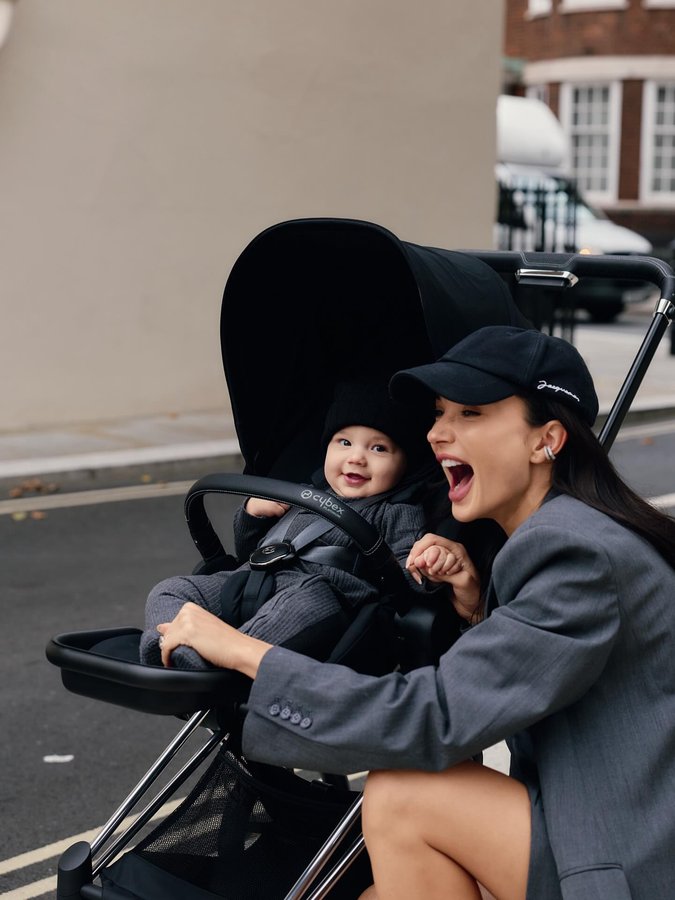 Instagram post by @iamamyjackson for CYBEX. Caption reads: Big boy style 🖤
First ride in his new....