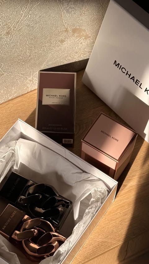 Instagram post by @redmone_ for Michael Kors. Caption reads: [...] reaching for , again and again from....