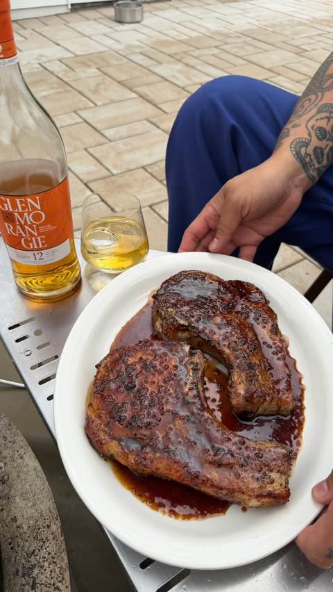 Instagram post by @chuckcruz for Glenmorangie. Caption reads: [...] pork chop over the open fire with....