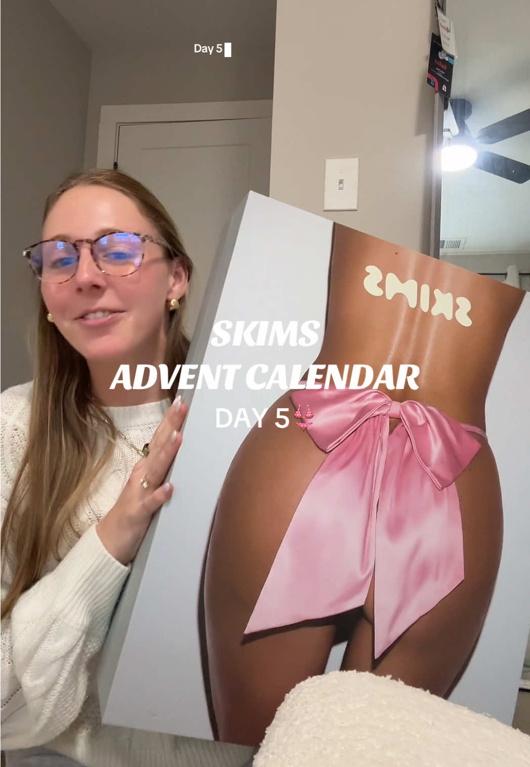 TikTok post by @mayasfavefinds for Skims. Caption reads: who wants them🥲 @SKIMS #adventcalendar....