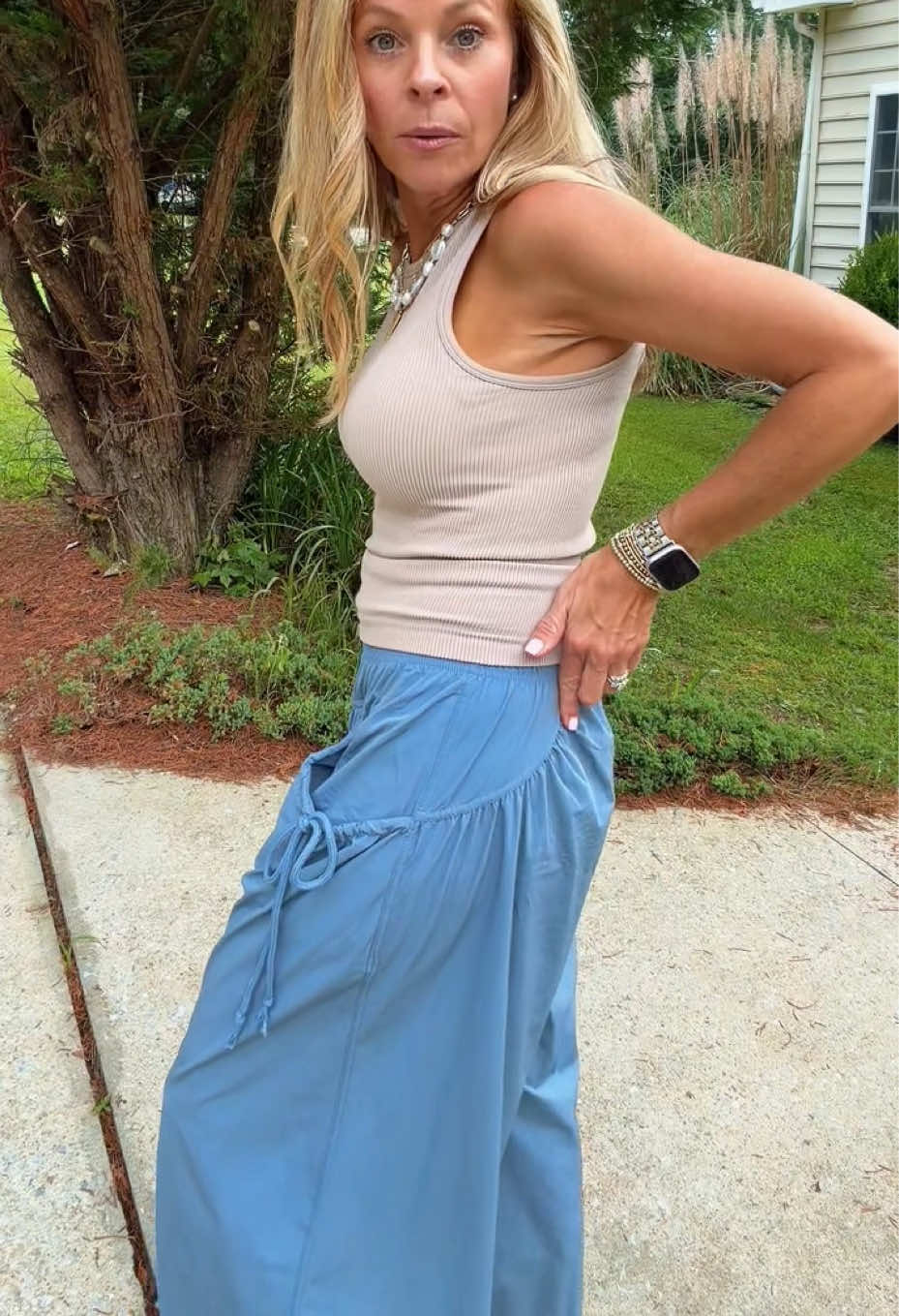 TikTok post by an influencer for SCUSTY. Caption reads: [...] #fplookforless #widelegpants @SCUSTY.