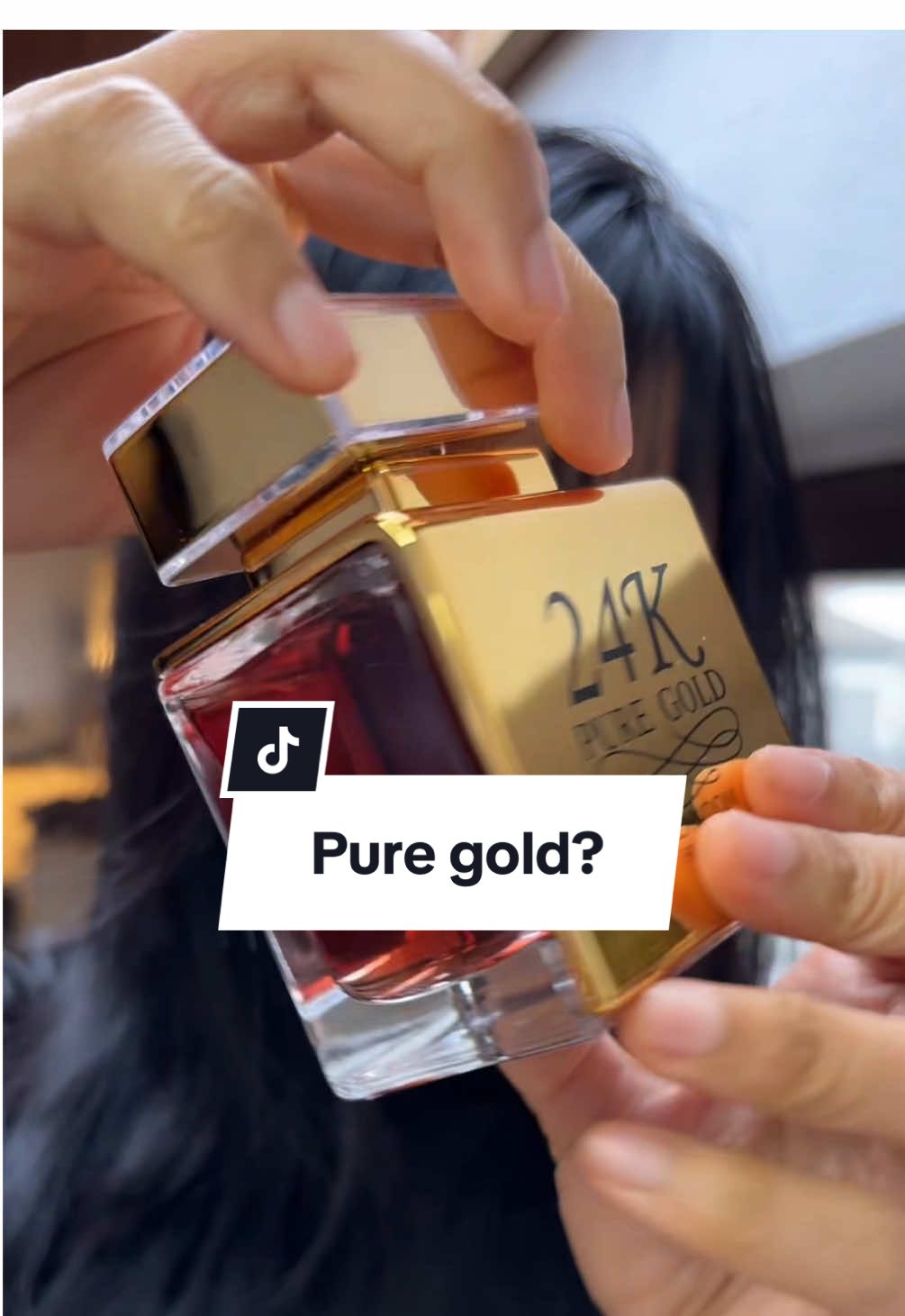 TikTok post by @windyrann_ for LONKOOM.ES. Caption reads: 24k pure gold perfume @LONKOOM.ES #lonkoomperfume....