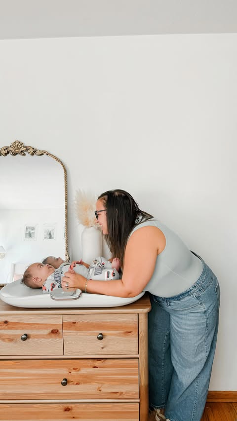 Instagram post by an influencer for Woddle Baby. Caption reads: [...] changing pad! 🎶 Grab the @woddlebaby Smart....