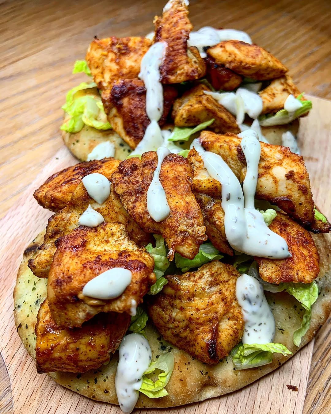 Instagram post by @hopecrosby_eats for Spicentice. Caption reads: TIKKA LOADED NAAN BREADS ✨
Yummmmmmmmy, this was....