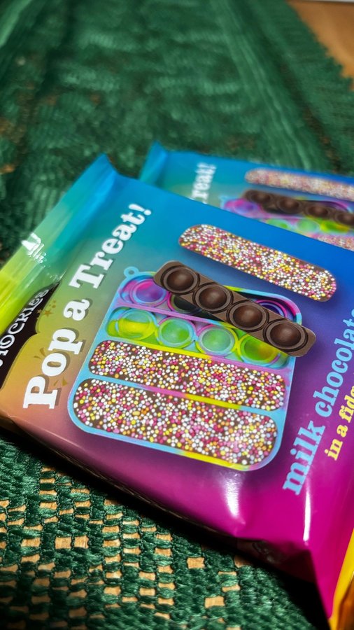 Instagram post by @chroniclesof3adventurers for Cocoba Chocolate. Caption reads: Pop a treat! 🍫 Ad @cocobachocolate have these....