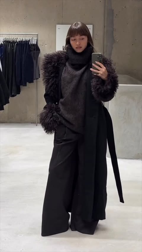 Instagram post by @telmaxlouise for WEEKDAY. Caption reads: #ad at @weekdayofficial 
Got my winter outfit in....