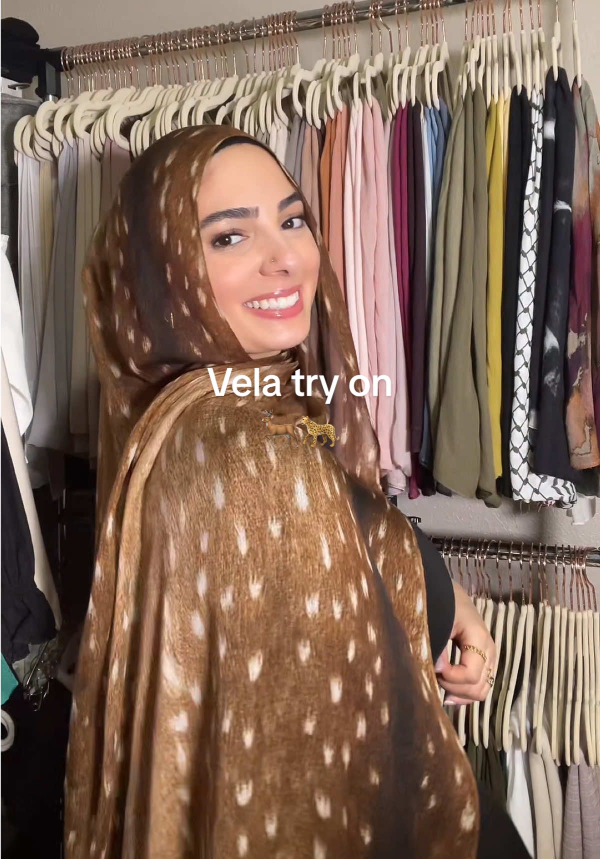 TikTok post by @reemhajeir for VELA. Caption reads: Re-naming Fawn print to ريم 🦌🤎@velascarves....