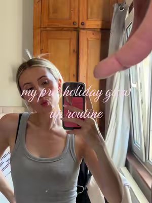 TikTok post by @sarahniamhh for bBold Tan. Caption reads: pre holiday routine ✨🏝️ #holidayglow #gwrm....