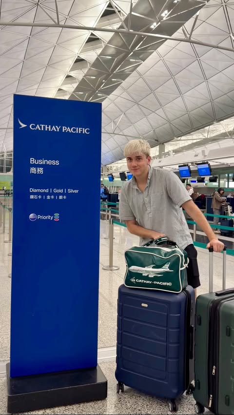 Instagram post by @logansfewd for Cathay Pacific. Caption reads: POV: you wrap up an awesome Hong Kong trip and fly....