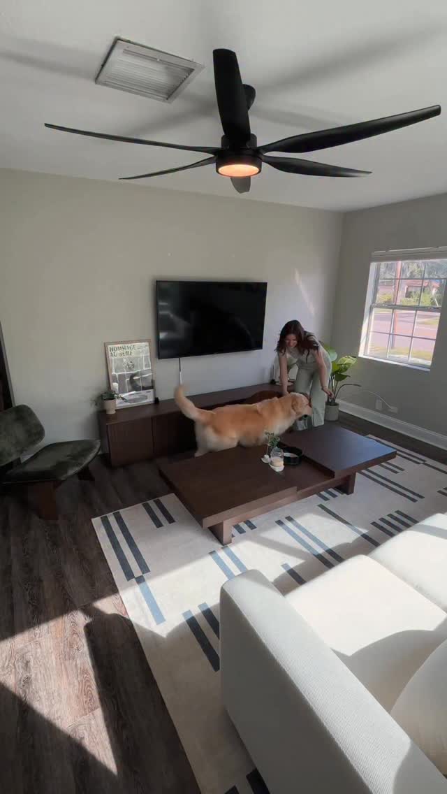 Instagram post by @londonchandler for Cozey. Caption reads: so so in love with how the living room turned out!....