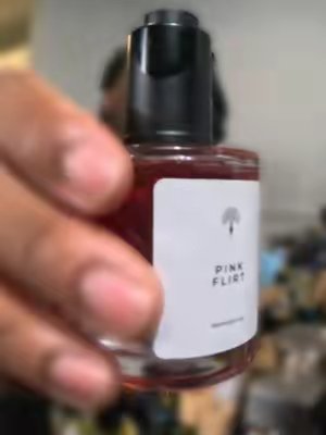 TikTok post by @rennie555 for Eternal Perfume Oils. Caption reads: Pink Flirt Eternal Perfume Oils Blind Review Who....