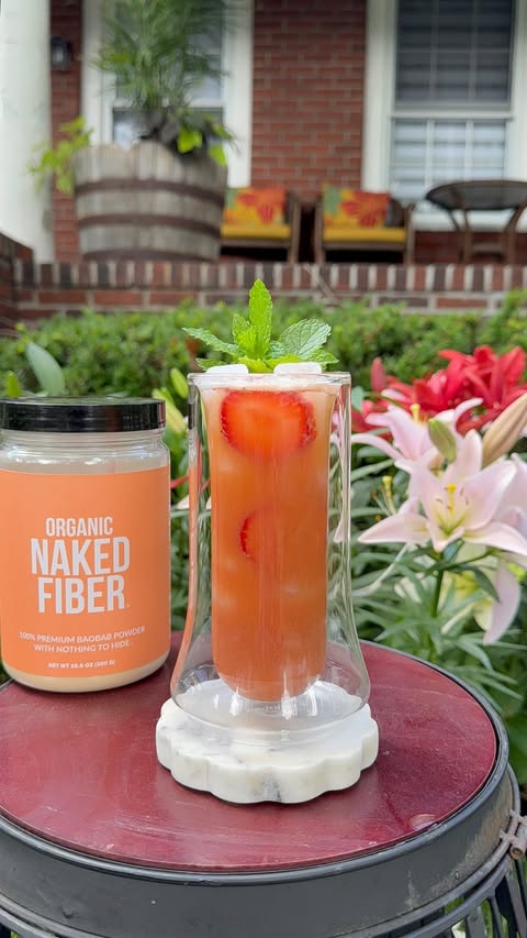 Instagram post by @lifestylebyanju for NAKED nutrition. Caption reads: [...] 4 oz water 1 scoop @Nakednutrition Fiber 2....