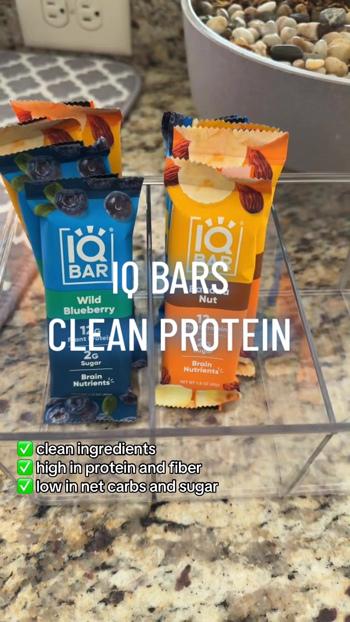 TikTok post by @hollyannblanton for IQBAR. Caption reads: [...] #proteinsnack #proteinbar #onthego #iqbar....