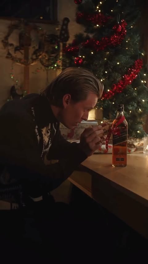 Instagram post by @bryncp for Johnnie Walker. Caption reads: Tis the season of @johnniewalker 🎄Give the gift....