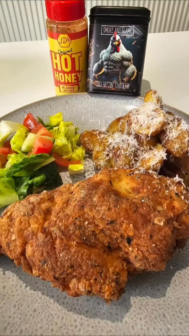 Instagram post by @smokeandflameuk for JD’s Hot Honey. Caption reads: [...] Served with baby potatoes roasted in....
