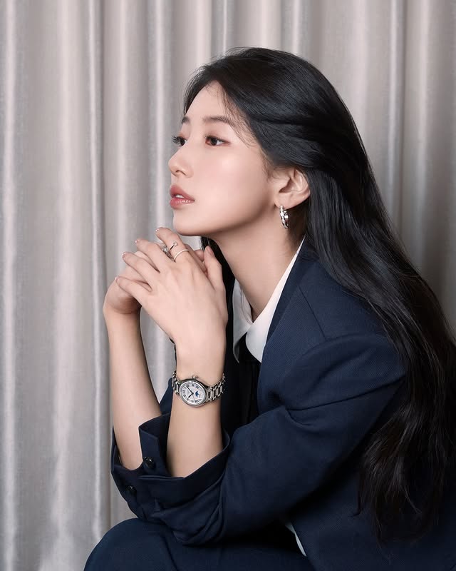 Instagram post by @skuukzky for Longines. Caption reads: [...] and timeless. @skuukzky wearing her LONGINES....