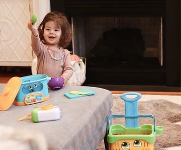 Instagram post by @thisjoyful_life for Leapfrog. Caption reads: Mila is cooking up a storm these days thanks to....