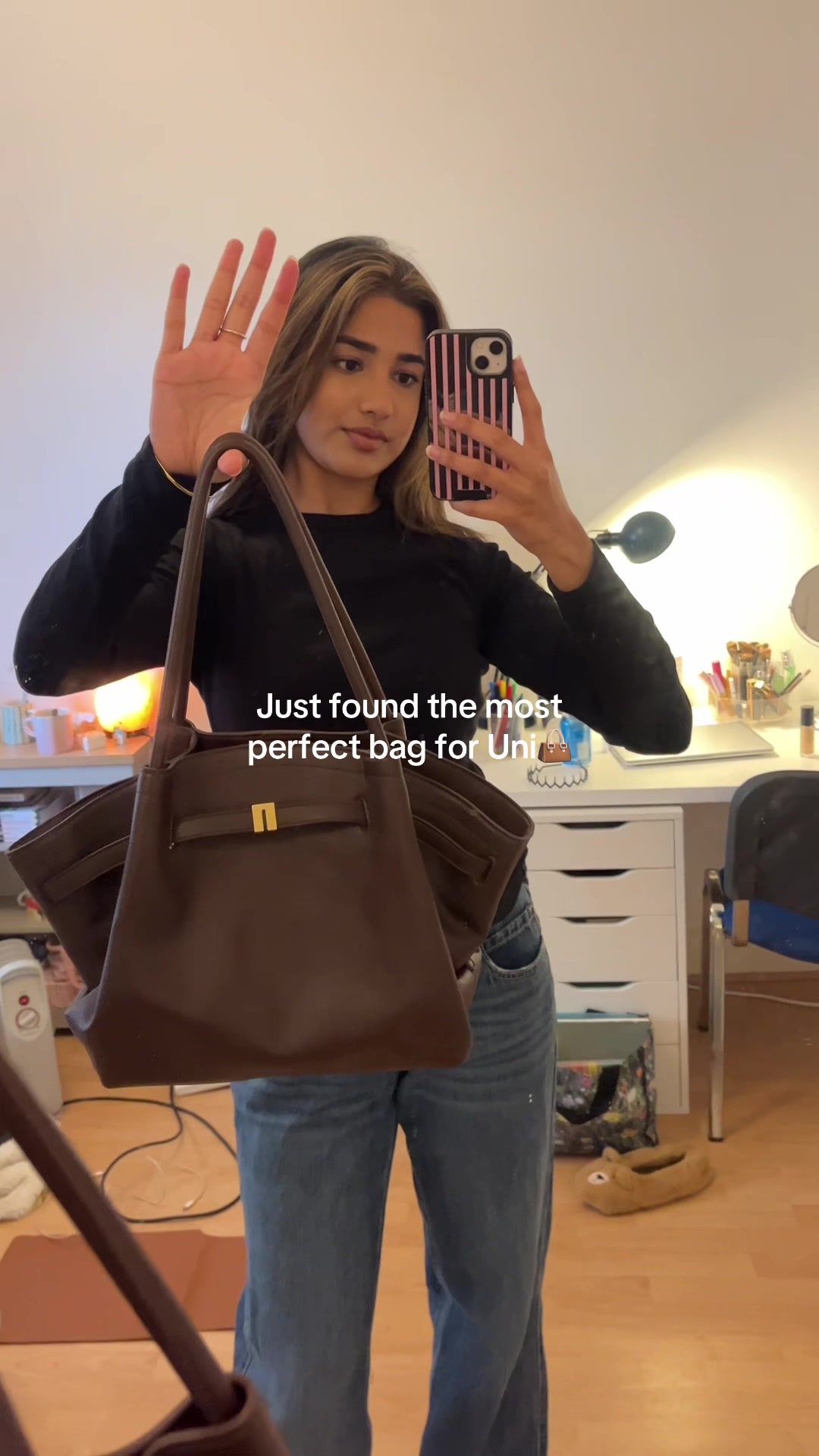 TikTok post by @joannalouiss for JW PEI. Caption reads: [...] the Hana medium tote in dark brown from @JW....