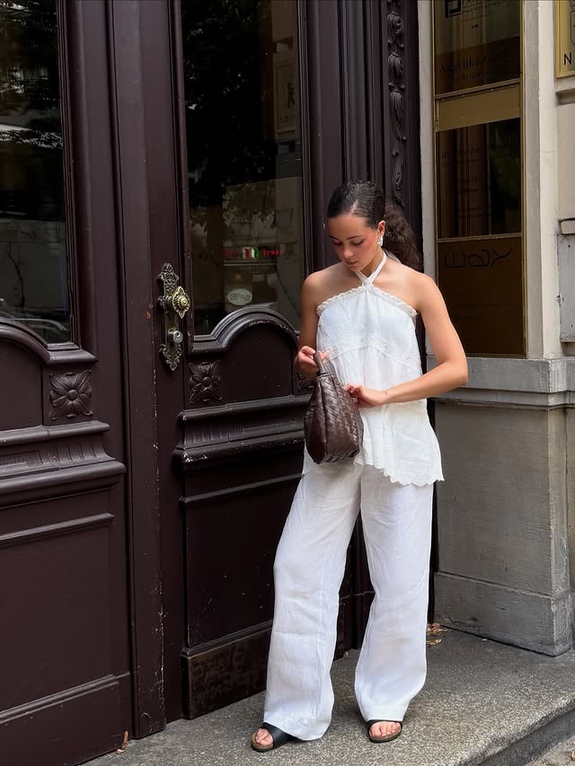 Instagram post by @julia_stephaniie for NA-KD. Caption reads: [...] Also me: ends up wearing the new....