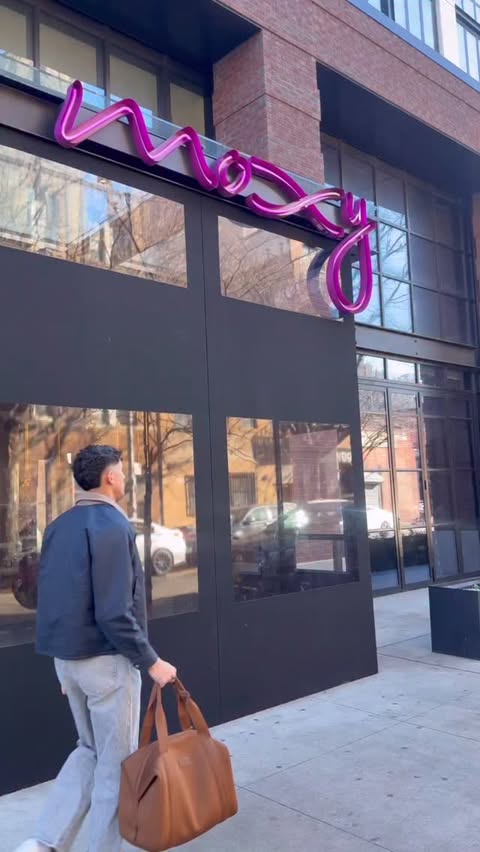 Instagram post by @kennethpabon for Moxy Hotels. Caption reads: Checking into @moxyhotels for the holidays ✨....