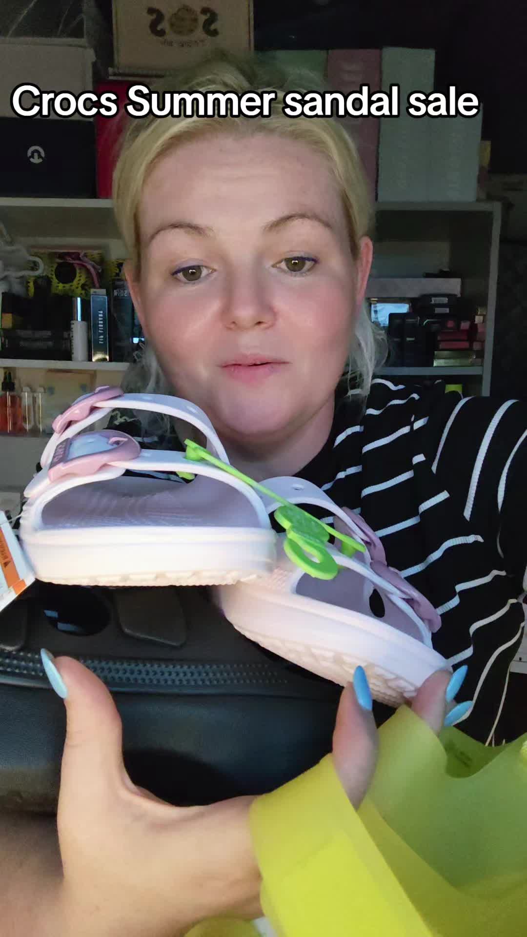 TikTok post by @gooshimomma for The Collective Agency. Caption reads: [...] Saturday Sandals from @Crocs @The Collective....