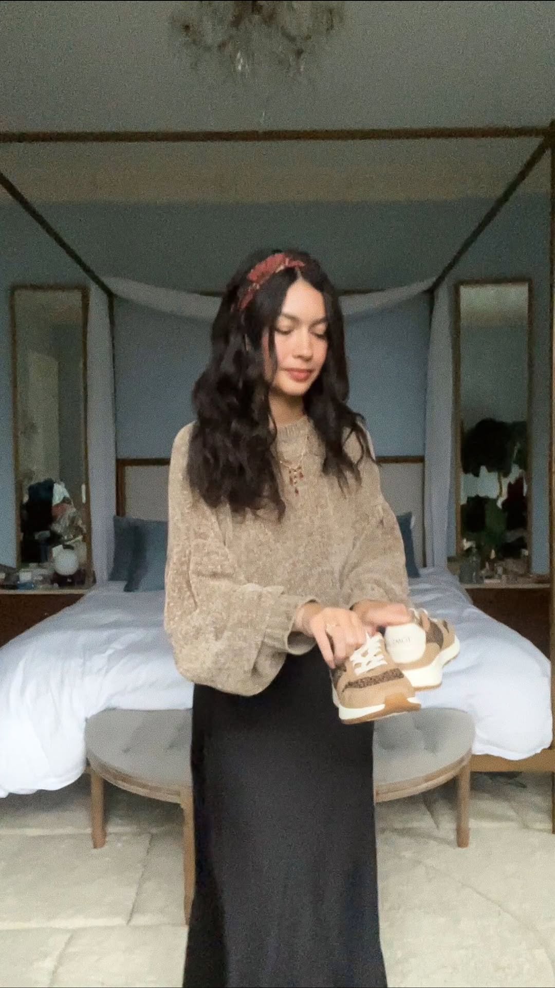 Instagram post by @bethanyciotola for TOMS. Caption reads: [...] water-repellant 🌧️ sneakers from @toms TRVL....