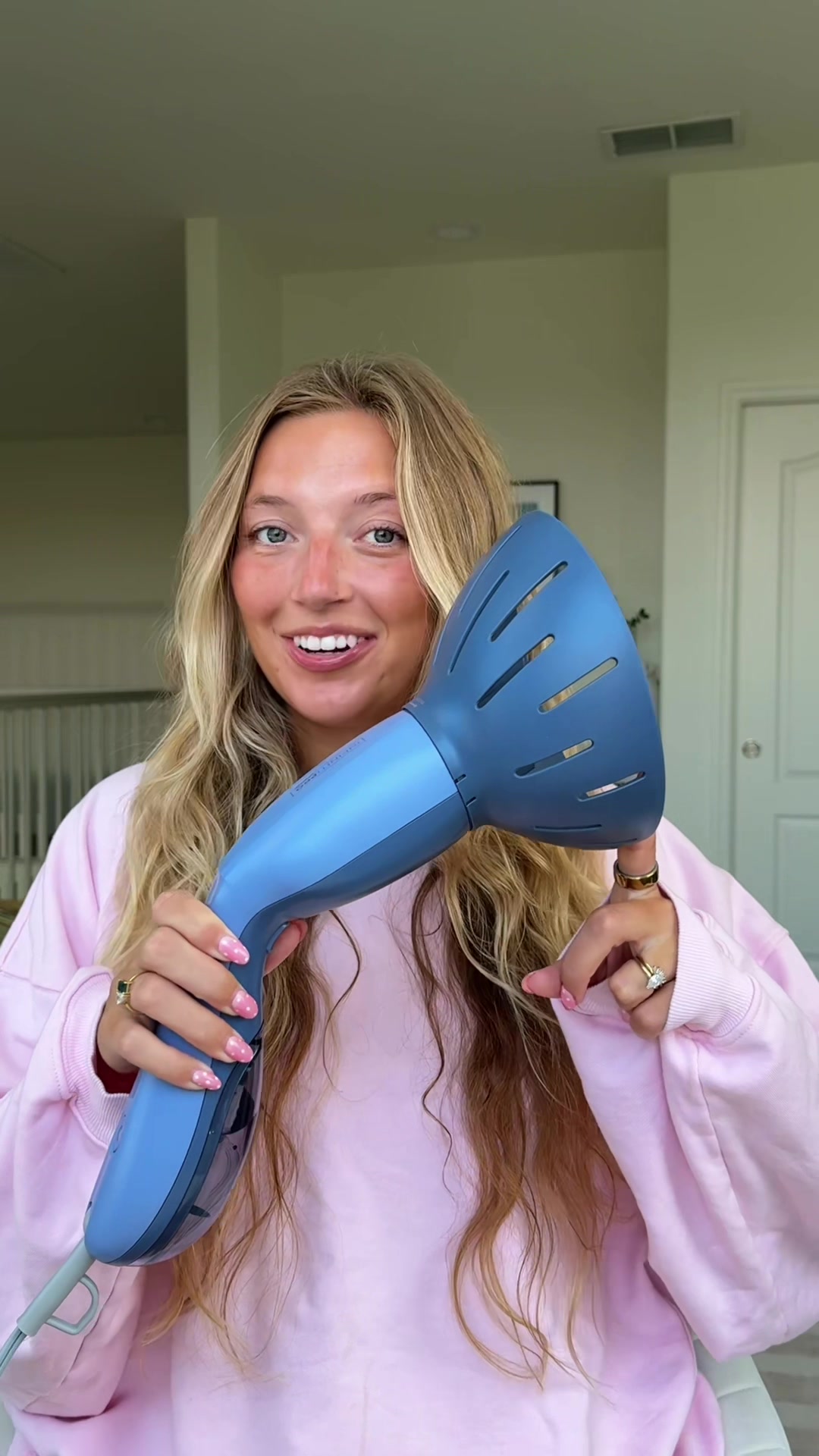 TikTok post by @itsgretawilson for Conair. Caption reads: Day 2 wave refresh using the @Conair InfinitiPRO....