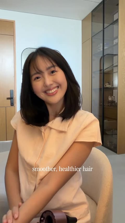 Instagram post by @nadyavalerie for Dyson. Caption reads: Hands on the BEST travel hair dryer @dyson_id only....