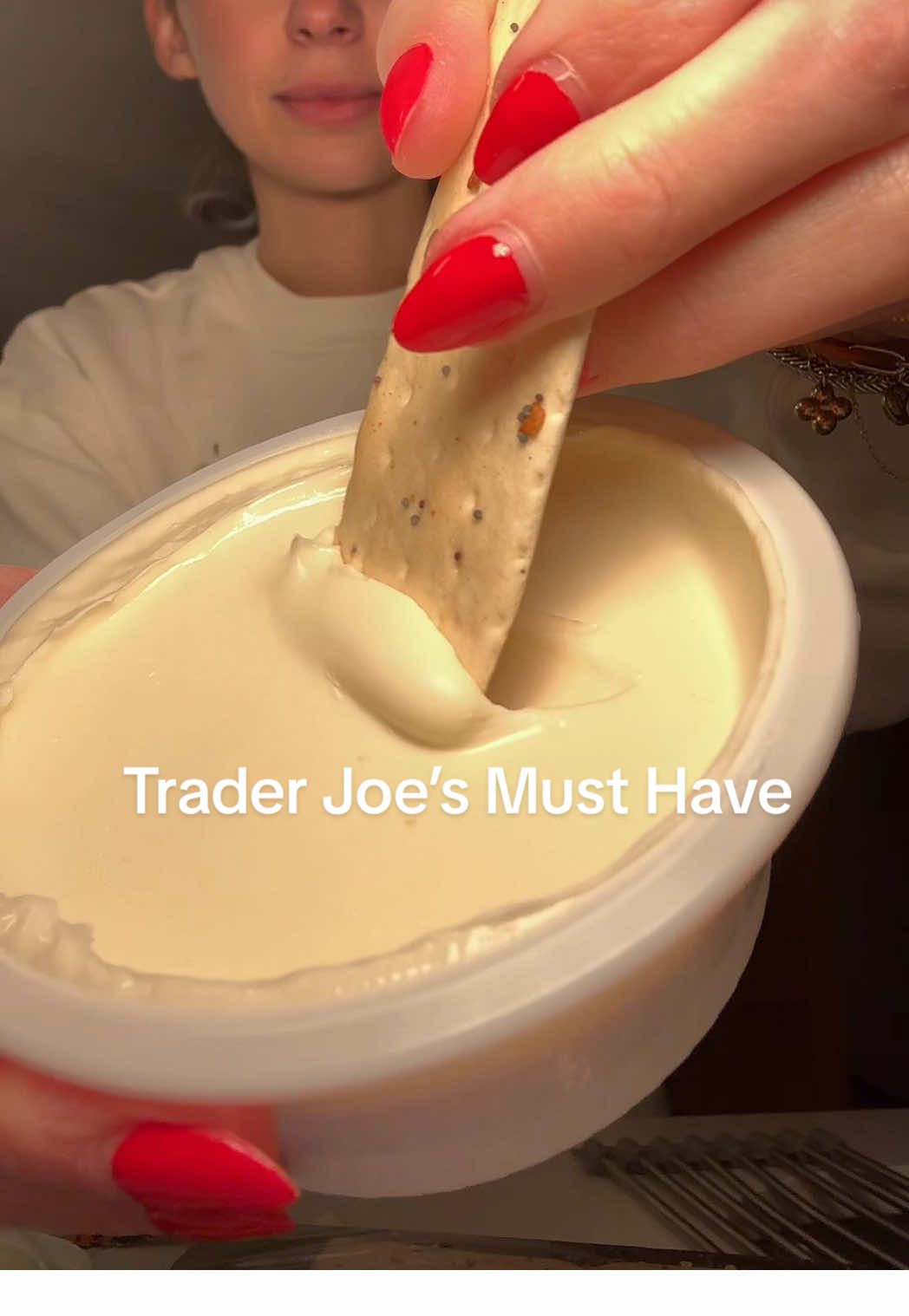 TikTok post by @emilysumnerrr for Trader Joe's. Caption reads: [...] from Trader Joe’s gets a chef’s kiss @Trader....