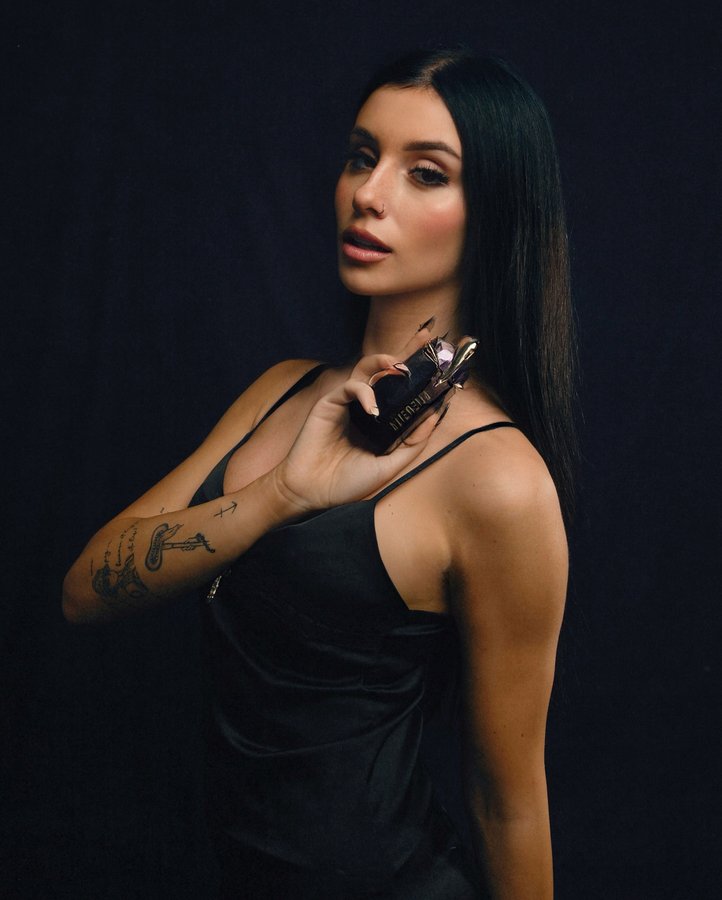 Instagram post by @aliceeperego for Mugler. Caption reads: extraterrestrial charm 🖤 @muglerofficial....