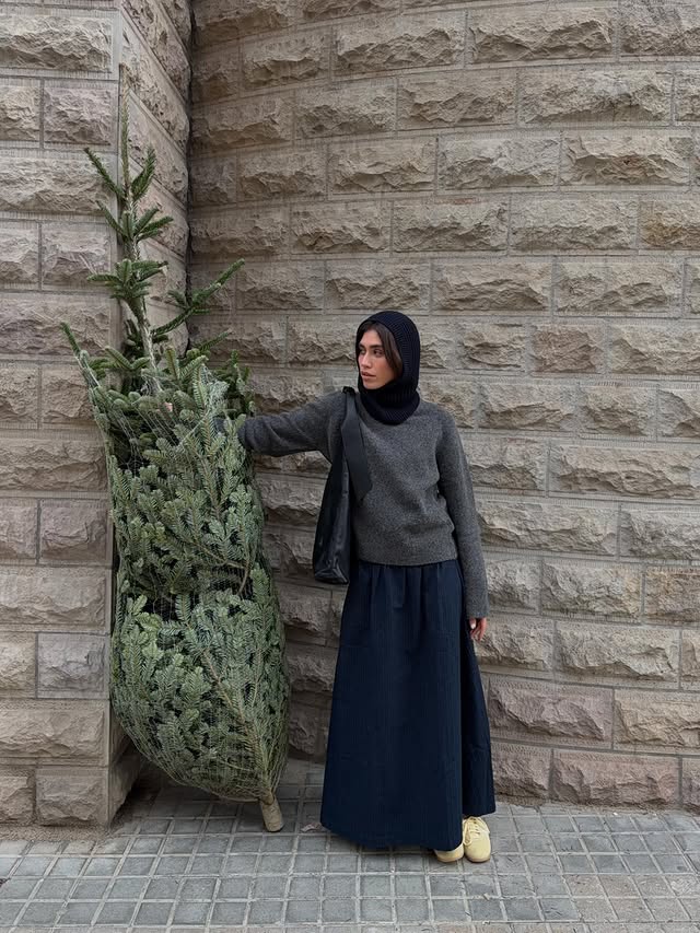Instagram post by an influencer for Zalando. Caption reads: [...] Christmas tree taller than me @zalando....