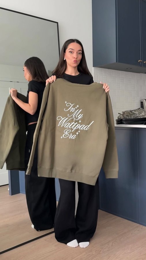 Instagram post by @nataliealysa for Wattpad. Caption reads: GRWM in the limited edition @wattpad merch....