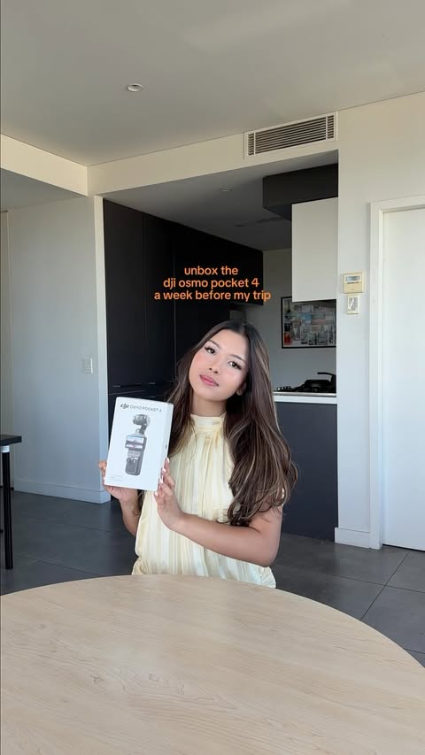 Instagram post by @sofiaqistine for DJI. Caption reads: Unbox the DJI Osmo Pocket 4 with me🌎🤍⭐️ I’ve....